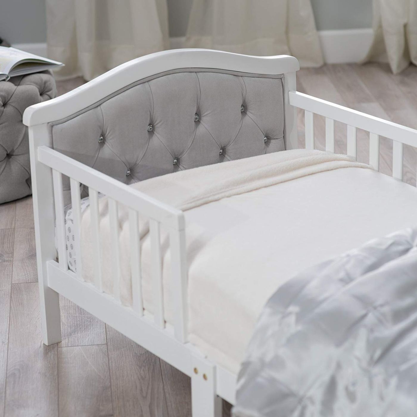 Crystal-button tufted headboard detail